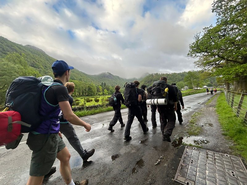 people walking in the lake district