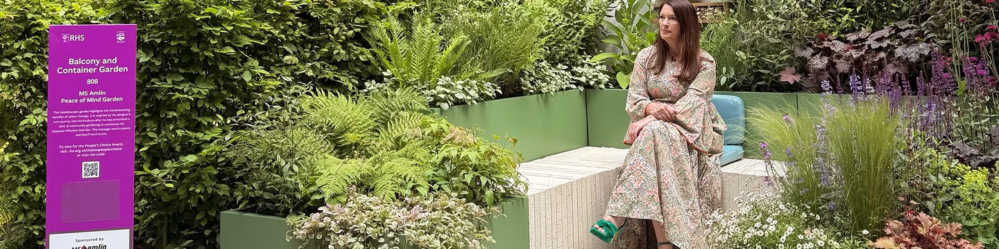 Rachel de Thame sits in our Chelsea Flower Show garden, designed to promote mental wellbeing