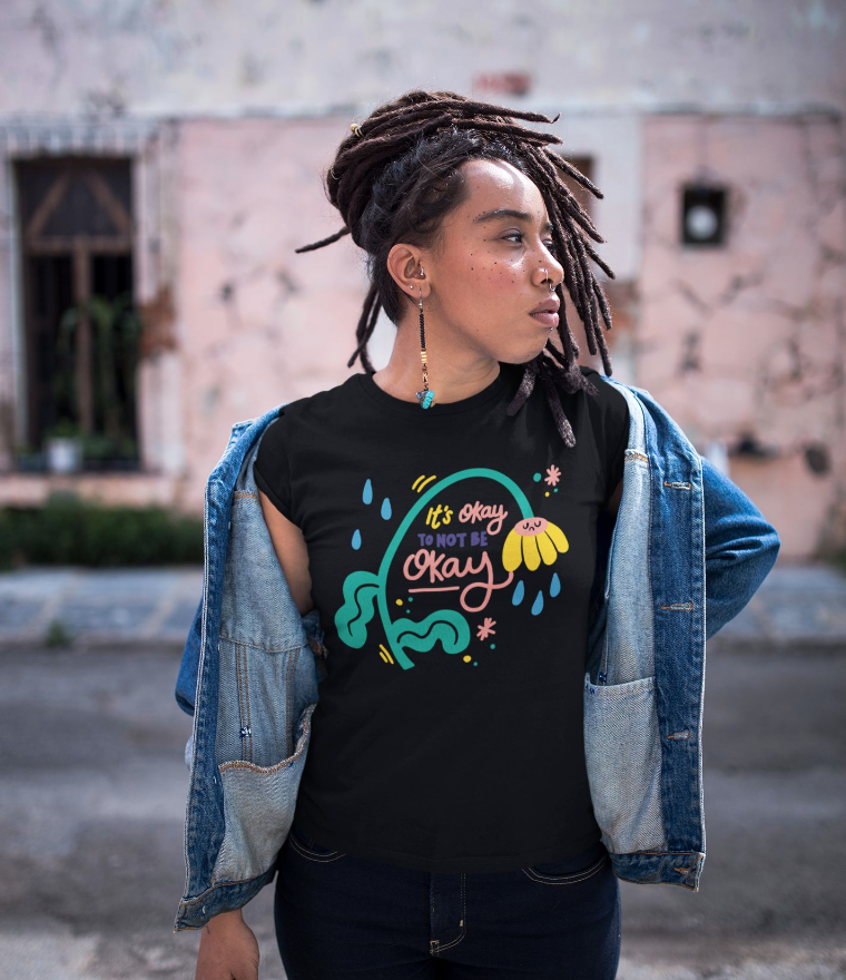Girl in 'It's Ok To Not Be Ok' t-shirt.png