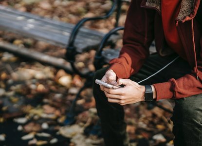 person-hands-phone-autumn.jpg