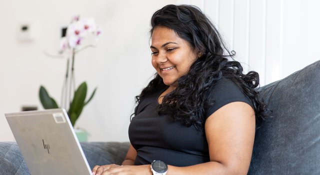 volunteer working at laptop.jpg