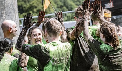 tough-mudder-team-high-five